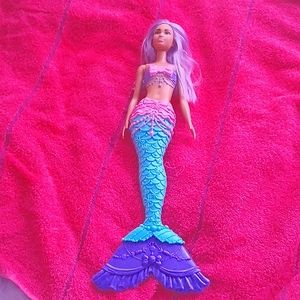 I am selling a mermaid barbie doll
